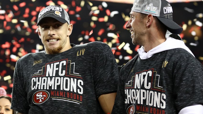 SANTA CLARA, CALIFORNIA – JANUARY 19: George Kittle #85 of the San Francisco 49ers and head coach Kyle Shanahan of the San Francisco 49ers celebrates after winning the NFC Championship game against the Green Bay Packers at Levi’s Stadium on January 19, 2020 in Santa Clara, California. The 49ers beat the Packers 37-20. (Photo by Ezra Shaw/Getty Images)