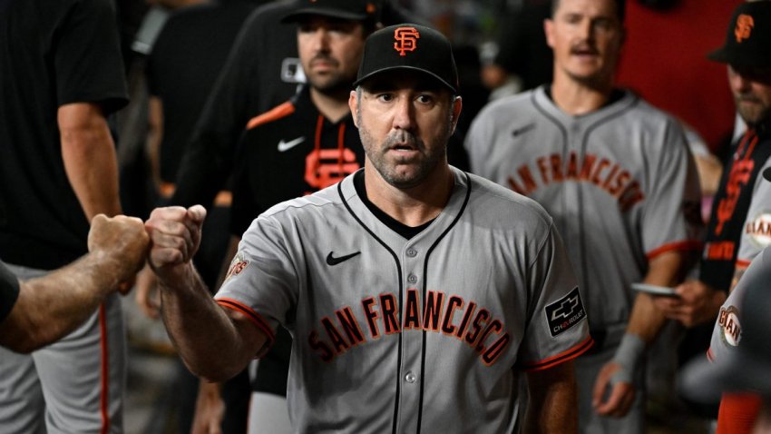 PHOENIX, ARIZONA – SEPTEMBER 17: Justin Verlander #35 of the San Francisco Giants is congratulated by teammates in the dugout against the Arizona Diamondbacks at Chase Field on September 17, 2025 in Phoenix, Arizona. (Photo by Norm Hall/Getty Images)