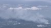 Firefighters battle wildfire west of Lake Tahoe