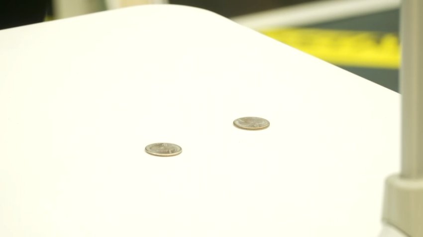 Coins placed on a table during closing arguments in the Lindsay Clancy murder trial on Aug. 27, 2026.
