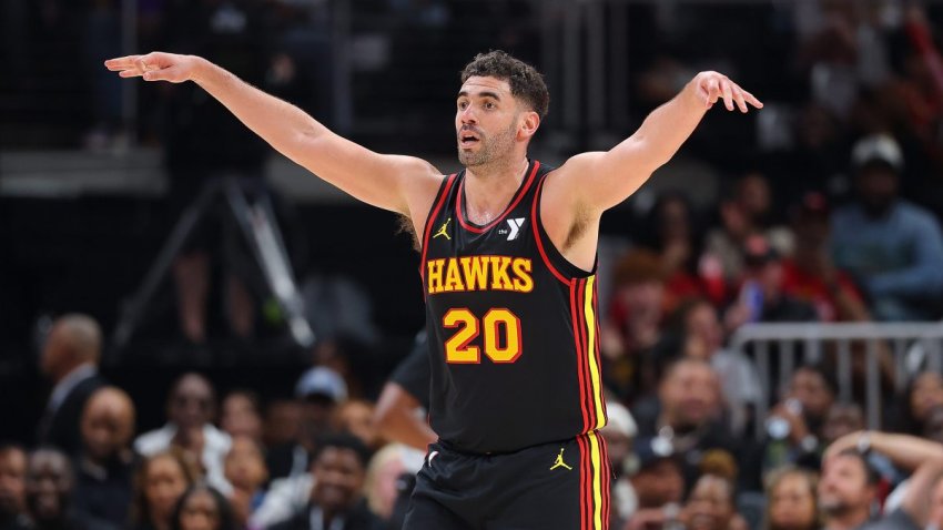 ATLANTA, GEORGIA – APRIL 18:  Georges Niang #20 of the Atlanta Hawks reacts after a three-point basket against the Miami Heat during the third quarter of an NBA play-in tournament game on April 18, 2025 in Atlanta, Georgia.  NOTE TO USER: User expressly acknowledges and agrees that, by downloading and or using this photograph, User is consenting to the terms and conditions of the Getty Images License Agreement.  (Photo by Kevin C. Cox/Getty Images)