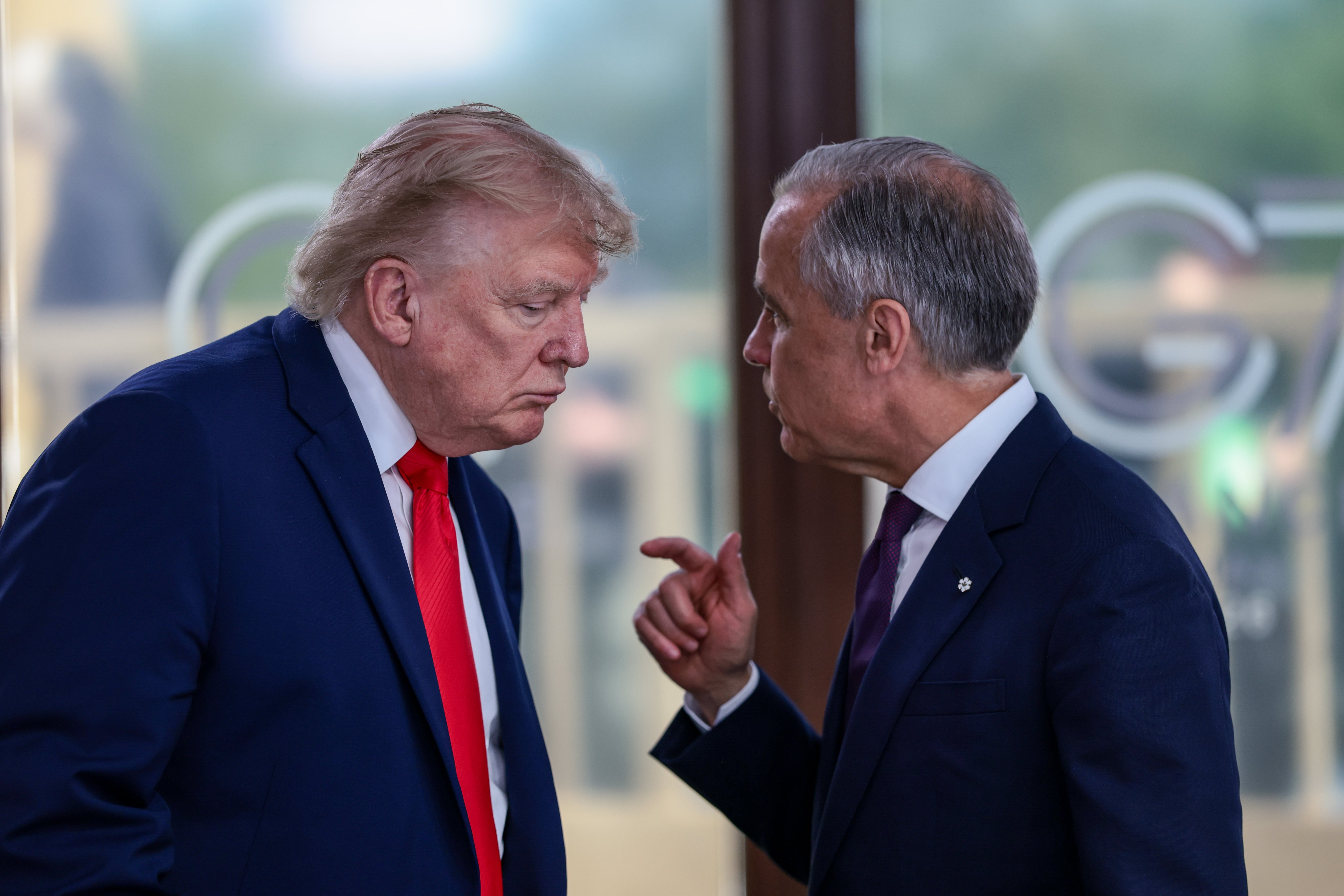 Trump hits back at Carney, threatens to hike auto, truck, metals tariffs to 50%