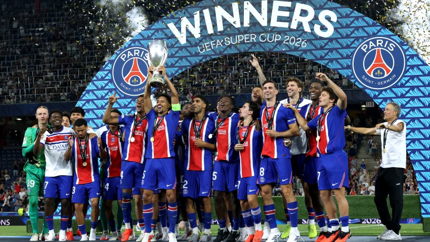 PSG lifts the UEFA Super Cup trophy.