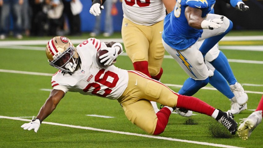 Inglewood,  – August 20:  Running back Kaelon Black #26 of the San Francisco 49ers dives for yardage against linebacker Bud Dupree #48 of the Los Angeles Chargers in the first half of a NFL preseason football game at SoFi Stadium in Inglewood on Thursday, August 20, 2026.  (Photo by Keith Birmingham/MediaNews Group/Pasadena Star-News via Getty Images)