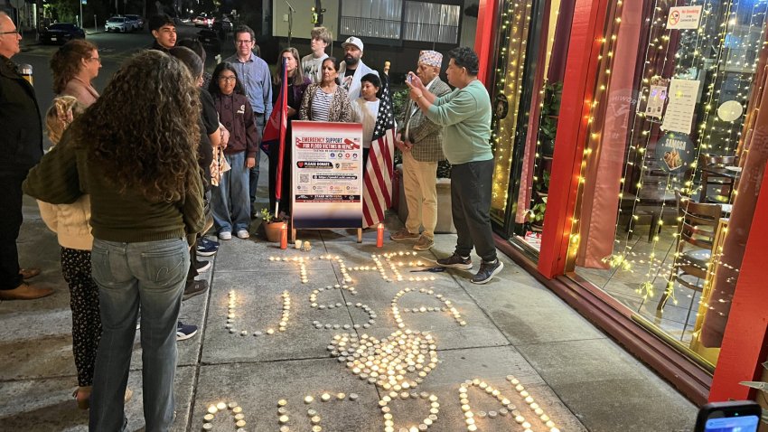 Neighbors and Nepali American community members gather at Taste of Himalayas restaurant in Berkeley for a vigil for those impacted by the flooding in Nepal-Tibet. August 30, 2026. NBC Bay Area Photo/ Alyssa Goard.