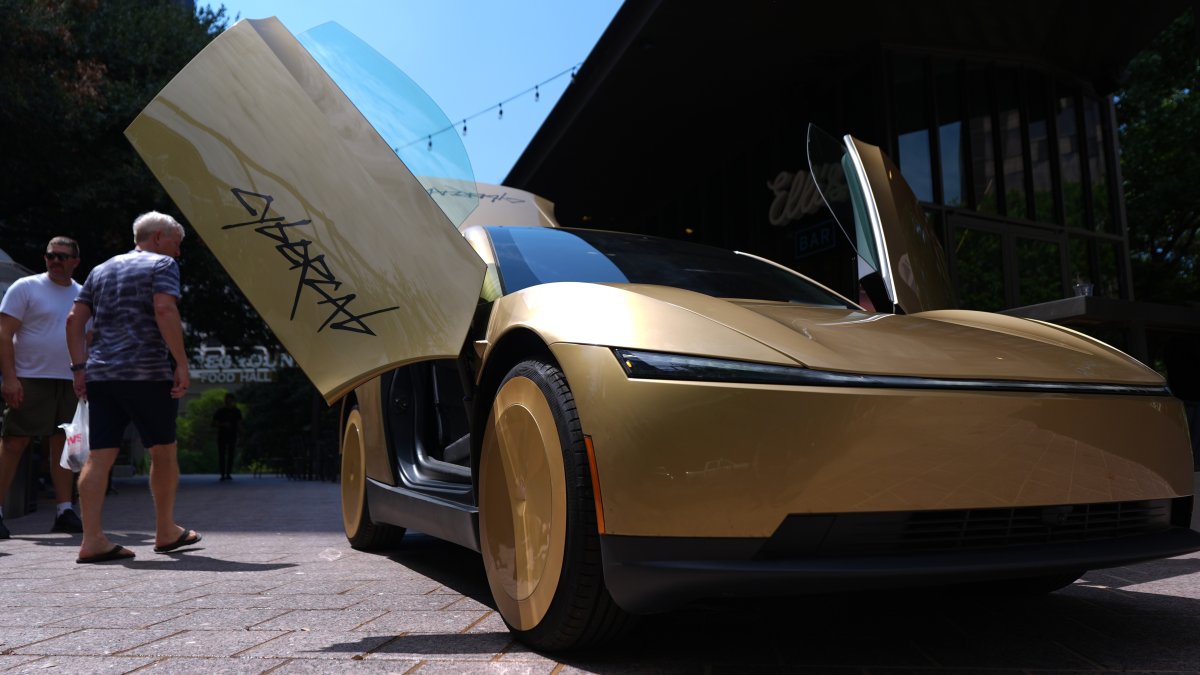 Musk launches steering-wheel-free taxi service in bet riders lose ‘no control' fears and hop inside