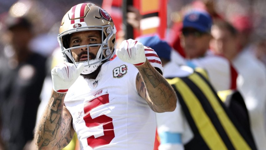 San Francisco 49ers’ wide receiver #5 Mike Evans celebrates after completing a pass during the NFL match between Los Angeles Rams and San Francisco 49ers at the Melbourne Cricket Ground (MCG) in Melbourne on September 11, 2026. (Photo by Martin KEEP / AFP via Getty Images) / –IMAGE RESTRICTED TO EDITORIAL USE – STRICTLY NO COMMERCIAL USE–
