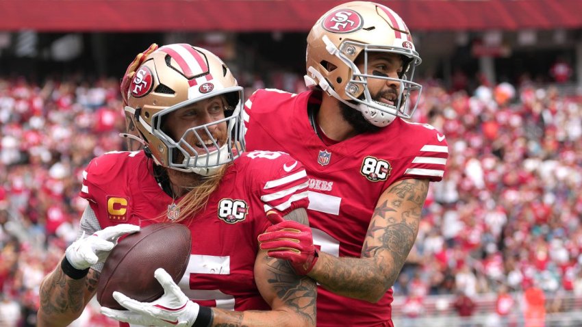 SANTA CLARA, CALIFORNIA – SEPTEMBER 20: George Kittle #85 and Mike Evans #5 of the San Francisco 49ers celebrate after Kittle’s receiving touchdown in the third quarter of a game against the Miami Dolphins at Levi’s Stadium on September 20, 2026 in Santa Clara, California. (Photo by Thearon W. Henderson/Getty Images)