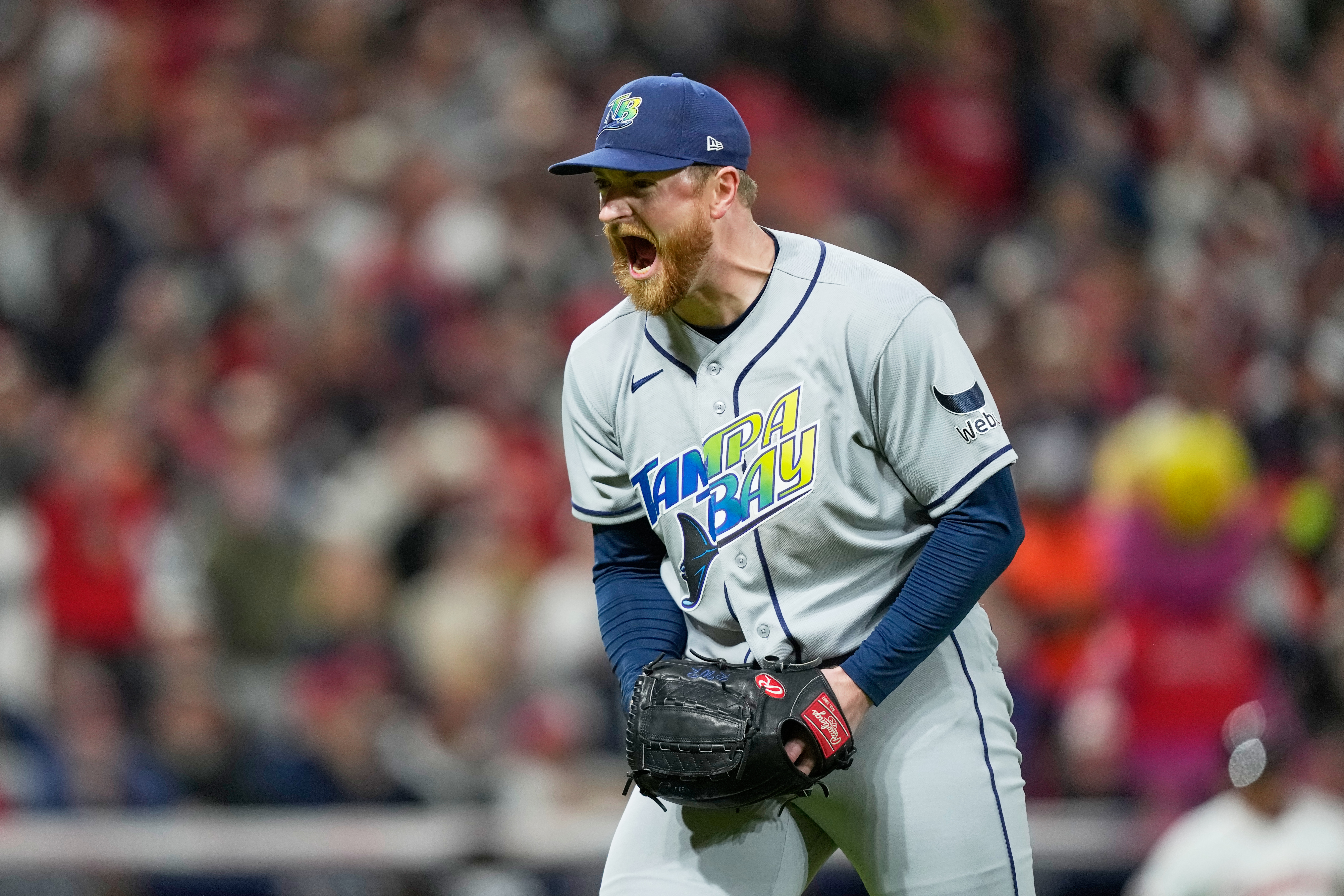 Tampa Bay Rays pitcher Drew Rasmussen celebrates the end of the seventh inning against the Cleveland Guardians in Game 5 of an American League Championship Series baseball game in Cleveland, Sunday, Oct. 18, 2026.