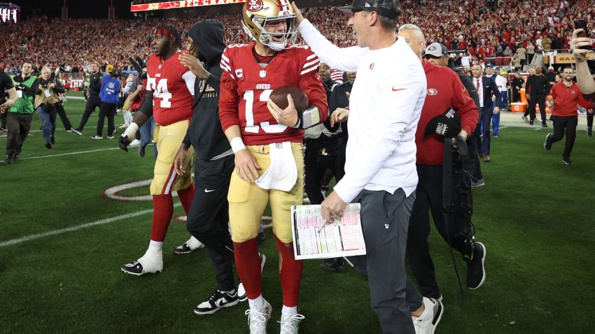 SANTA CLARA, CALIFORNIA – JANUARY 28: Brock Purdy #13 of the San Francisco 49ers celebrates with Head coach Kyle Shanahan  after defeating the Detroit Lions 34-31 in the NFC Championship Game at Levi’s Stadium on January 28, 2024 in Santa Clara, California. (Photo by Ezra Shaw/Getty Images)