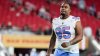Titans released Jordan Elliott after he pulled out gun in parking lot, head coach says 