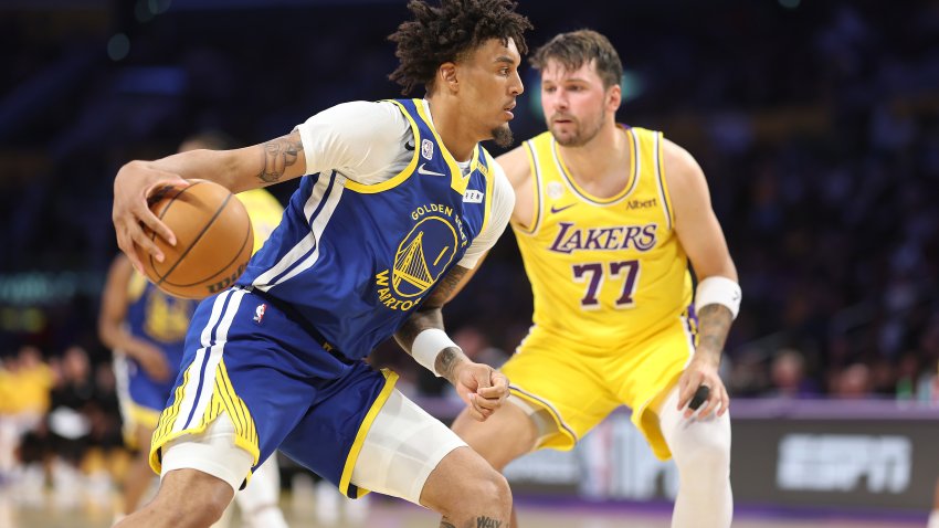 LOS ANGELES, CALIFORNIA – OCTOBER 21: Yaxel Lendeborg #1 of the Golden State Warriors dribbles into the defense. of Luka Doncic #77 of the Los Angeles Lakers during the second half of a game at Crypto.com Arena on October 21, 2026 in Los Angeles, California. NOTE TO USER: User expressly acknowledges and agrees that, by downloading and or using this photograph, User is consenting to the terms and conditions of the Getty Images License Agreement.  (Photo by Sean M. Haffey/Getty Images)