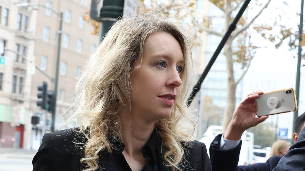 Who is Elizabeth Holmes and what did she do?