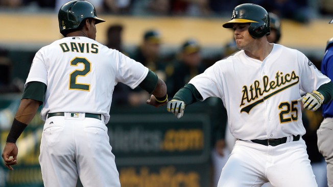 Athletics trade slugger Ryon Healy to Mariners for prospects