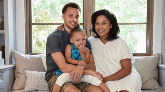 Stephan with pregnant wife Ayesha Curry and daughter Riley
